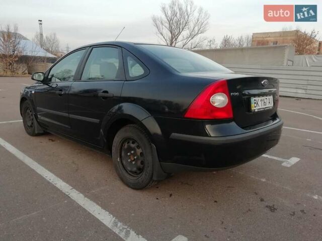 Черный Форд Фокус, объемом двигателя 1.4 л и пробегом 31 тыс. км за 6000 $, фото 2 на Automoto.ua