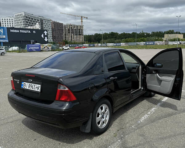 Черный Форд Фокус, объемом двигателя 2 л и пробегом 260 тыс. км за 4400 $, фото 2 на Automoto.ua