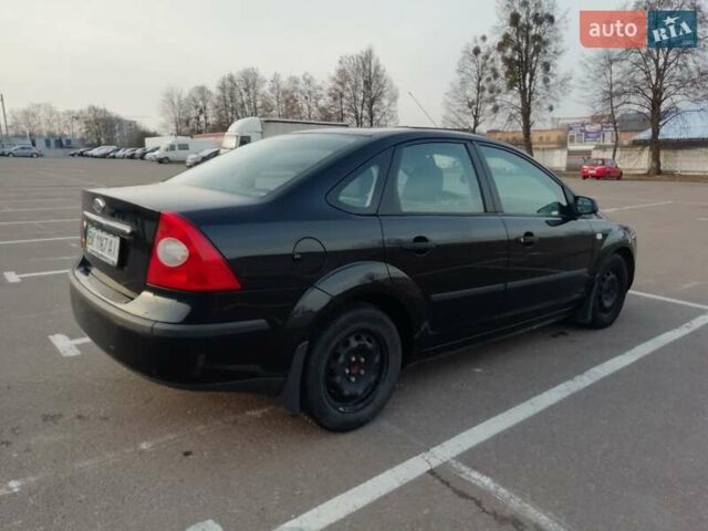 Черный Форд Фокус, объемом двигателя 1.4 л и пробегом 31 тыс. км за 6000 $, фото 5 на Automoto.ua