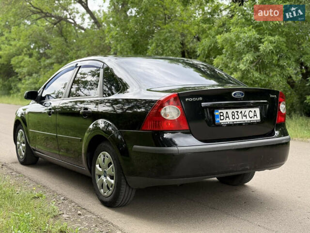 Черный Форд Фокус, объемом двигателя 1.6 л и пробегом 262 тыс. км за 4400 $, фото 5 на Automoto.ua
