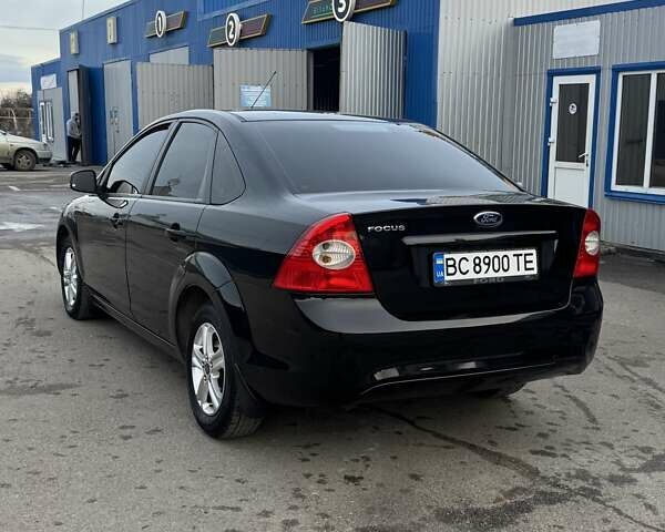 Черный Форд Фокус, объемом двигателя 1.6 л и пробегом 212 тыс. км за 5900 $, фото 6 на Automoto.ua