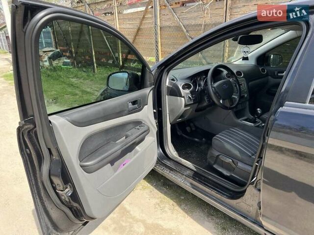 Черный Форд Фокус, объемом двигателя 1.6 л и пробегом 246 тыс. км за 4900 $, фото 12 на Automoto.ua