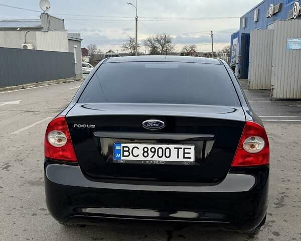 Черный Форд Фокус, объемом двигателя 1.6 л и пробегом 212 тыс. км за 5900 $, фото 5 на Automoto.ua
