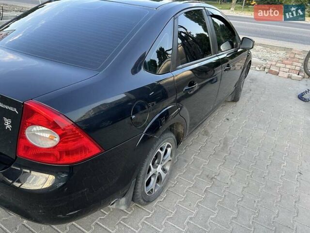 Черный Форд Фокус, объемом двигателя 1.6 л и пробегом 257 тыс. км за 5100 $, фото 4 на Automoto.ua