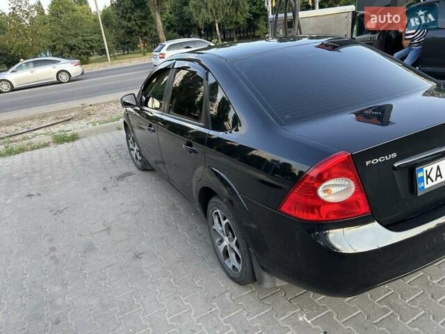 Черный Форд Фокус, объемом двигателя 1.6 л и пробегом 257 тыс. км за 5100 $, фото 6 на Automoto.ua