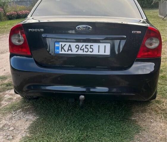 Черный Форд Фокус, объемом двигателя 1.8 л и пробегом 300 тыс. км за 4999 $, фото 5 на Automoto.ua