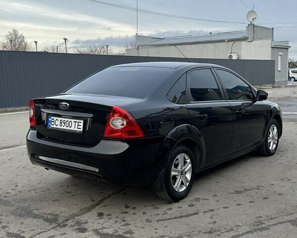 Черный Форд Фокус, объемом двигателя 1.6 л и пробегом 212 тыс. км за 5900 $, фото 4 на Automoto.ua