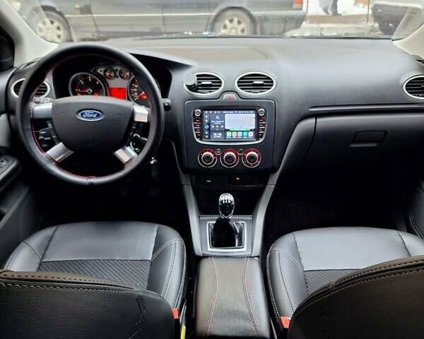 Черный Форд Фокус, объемом двигателя 1.8 л и пробегом 220 тыс. км за 5999 $, фото 2 на Automoto.ua