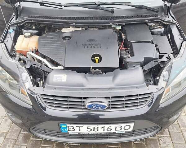 Черный Форд Фокус, объемом двигателя 1.8 л и пробегом 220 тыс. км за 5999 $, фото 16 на Automoto.ua