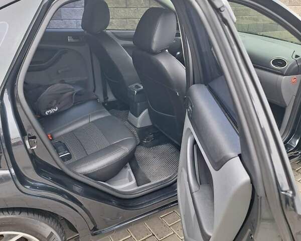 Черный Форд Фокус, объемом двигателя 1.8 л и пробегом 220 тыс. км за 5999 $, фото 3 на Automoto.ua