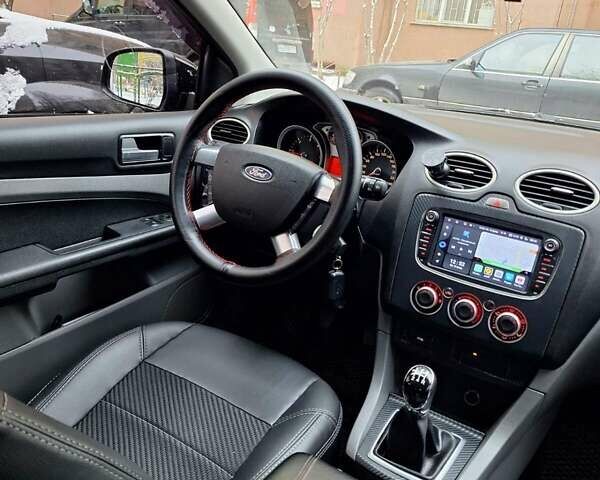 Черный Форд Фокус, объемом двигателя 1.8 л и пробегом 220 тыс. км за 5999 $, фото 14 на Automoto.ua