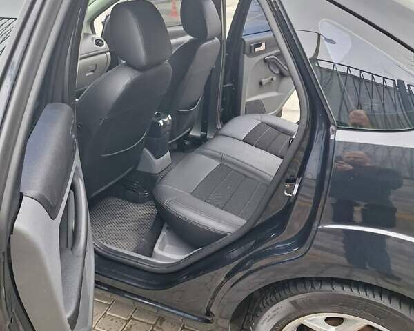 Черный Форд Фокус, объемом двигателя 1.8 л и пробегом 220 тыс. км за 5999 $, фото 1 на Automoto.ua