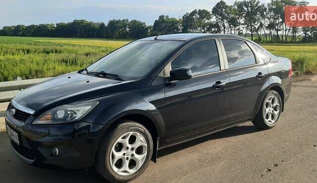 Черный Форд Фокус, объемом двигателя 1.6 л и пробегом 211 тыс. км за 6800 $, фото 5 на Automoto.ua