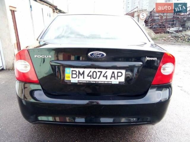 Черный Форд Фокус, объемом двигателя 1.6 л и пробегом 210 тыс. км за 5500 $, фото 5 на Automoto.ua