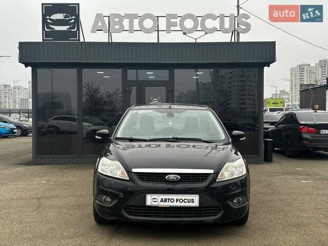 Черный Форд Фокус, объемом двигателя 1.6 л и пробегом 208 тыс. км за 6490 $, фото 1 на Automoto.ua