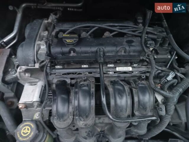 Черный Форд Фокус, объемом двигателя 1.6 л и пробегом 214 тыс. км за 5850 $, фото 1 на Automoto.ua