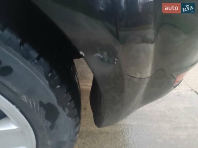 Черный Форд Фокус, объемом двигателя 1.6 л и пробегом 214 тыс. км за 5850 $, фото 10 на Automoto.ua