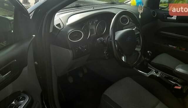 Черный Форд Фокус, объемом двигателя 1.6 л и пробегом 211 тыс. км за 6800 $, фото 12 на Automoto.ua