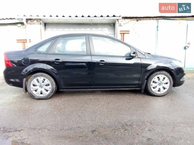 Черный Форд Фокус, объемом двигателя 1.6 л и пробегом 210 тыс. км за 5500 $, фото 2 на Automoto.ua