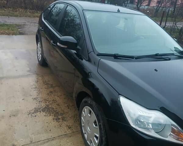 Черный Форд Фокус, объемом двигателя 1.6 л и пробегом 214 тыс. км за 5850 $, фото 16 на Automoto.ua