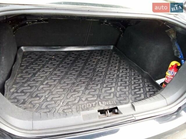 Черный Форд Фокус, объемом двигателя 1.6 л и пробегом 210 тыс. км за 5500 $, фото 21 на Automoto.ua