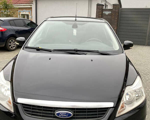 Черный Форд Фокус, объемом двигателя 2 л и пробегом 233 тыс. км за 6200 $, фото 1 на Automoto.ua