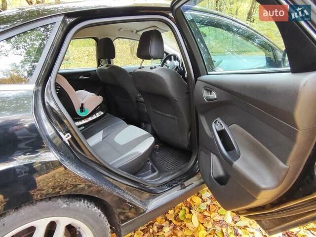 Черный Форд Фокус, объемом двигателя 1.6 л и пробегом 208 тыс. км за 6600 $, фото 5 на Automoto.ua