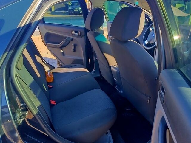 Черный Форд Фокус, объемом двигателя 1.6 л и пробегом 190 тыс. км за 6000 $, фото 8 на Automoto.ua