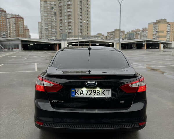 Чорний Форд Фокус, об'ємом двигуна 2 л та пробігом 347 тис. км за 5799 $, фото 10 на Automoto.ua