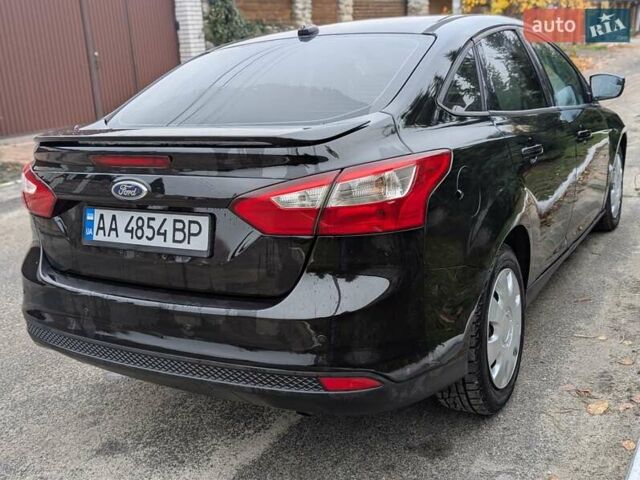 Чорний Форд Фокус, об'ємом двигуна 2 л та пробігом 138 тис. км за 6600 $, фото 9 на Automoto.ua
