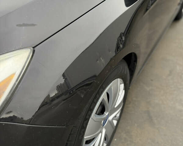 Чорний Форд Фокус, об'ємом двигуна 2 л та пробігом 347 тис. км за 5799 $, фото 5 на Automoto.ua