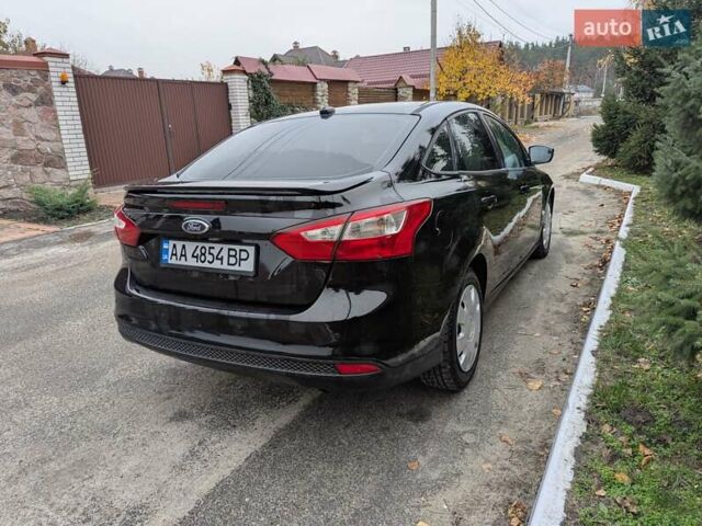 Чорний Форд Фокус, об'ємом двигуна 2 л та пробігом 138 тис. км за 6600 $, фото 2 на Automoto.ua