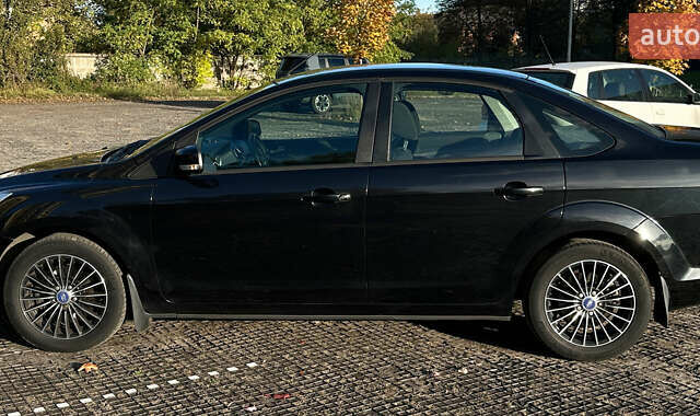Черный Форд Фокус, объемом двигателя 2 л и пробегом 57 тыс. км за 9800 $, фото 3 на Automoto.ua