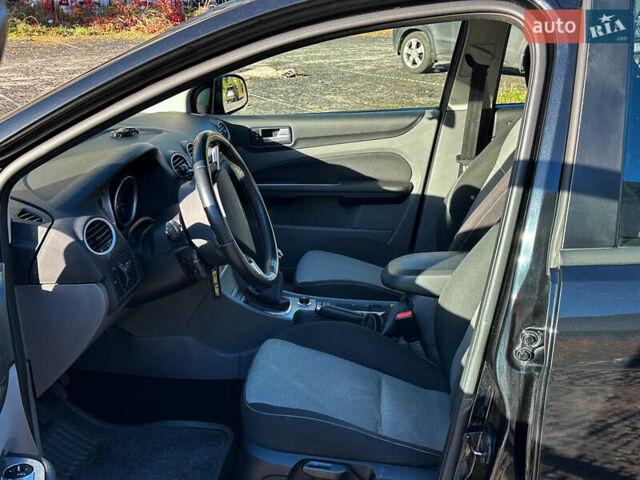 Черный Форд Фокус, объемом двигателя 2 л и пробегом 57 тыс. км за 9800 $, фото 9 на Automoto.ua