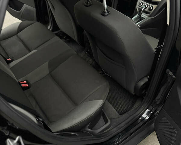 Чорний Форд Фокус, об'ємом двигуна 2 л та пробігом 347 тис. км за 5799 $, фото 22 на Automoto.ua