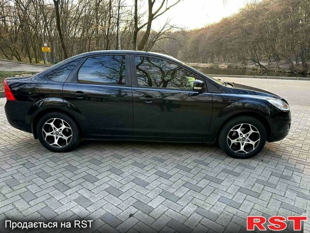 Черный Форд Фокус, объемом двигателя 1.6 л и пробегом 180 тыс. км за 5700 $, фото 1 на Automoto.ua