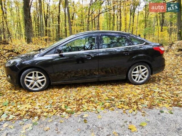 Черный Форд Фокус, объемом двигателя 1.6 л и пробегом 208 тыс. км за 6600 $, фото 2 на Automoto.ua