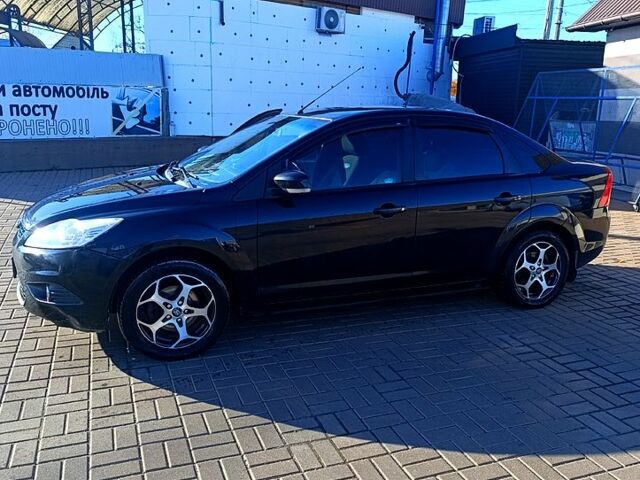 Черный Форд Фокус, объемом двигателя 1.6 л и пробегом 190 тыс. км за 6000 $, фото 4 на Automoto.ua