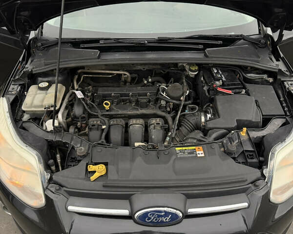 Чорний Форд Фокус, об'ємом двигуна 2 л та пробігом 347 тис. км за 5799 $, фото 23 на Automoto.ua