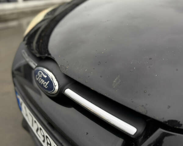 Чорний Форд Фокус, об'ємом двигуна 2 л та пробігом 347 тис. км за 5799 $, фото 7 на Automoto.ua