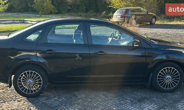 Черный Форд Фокус, объемом двигателя 2 л и пробегом 57 тыс. км за 9800 $, фото 2 на Automoto.ua