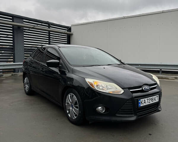 Чорний Форд Фокус, об'ємом двигуна 2 л та пробігом 347 тис. км за 5799 $, фото 2 на Automoto.ua