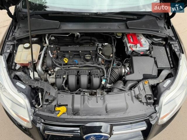 Чорний Форд Фокус, об'ємом двигуна 2 л та пробігом 169 тис. км за 7555 $, фото 80 на Automoto.ua