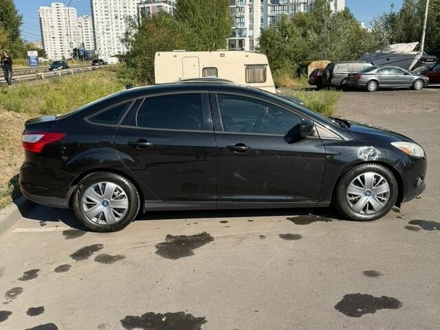 Чорний Форд Фокус, об'ємом двигуна 2 л та пробігом 347 тис. км за 4999 $, фото 18 на Automoto.ua