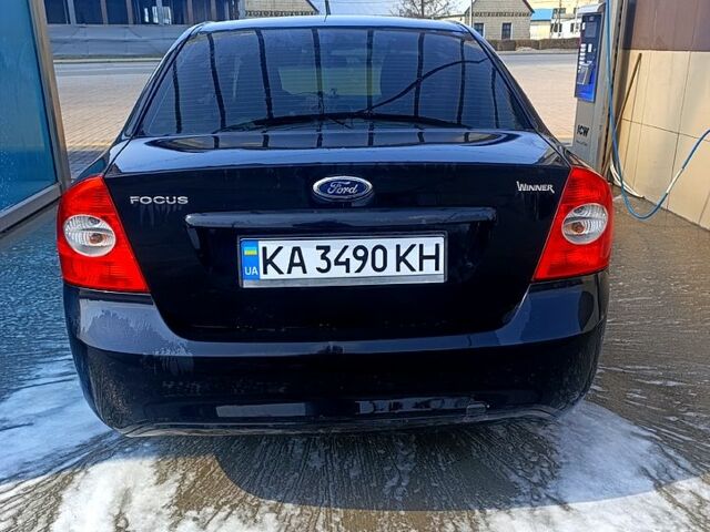 Черный Форд Фокус, объемом двигателя 1.6 л и пробегом 200 тыс. км за 5800 $, фото 4 на Automoto.ua