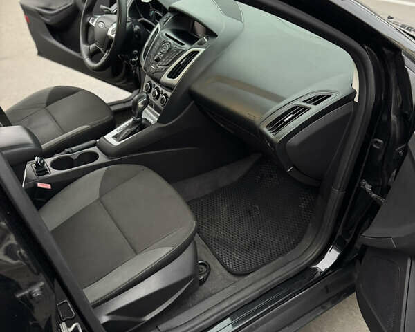 Чорний Форд Фокус, об'ємом двигуна 2 л та пробігом 347 тис. км за 5799 $, фото 17 на Automoto.ua