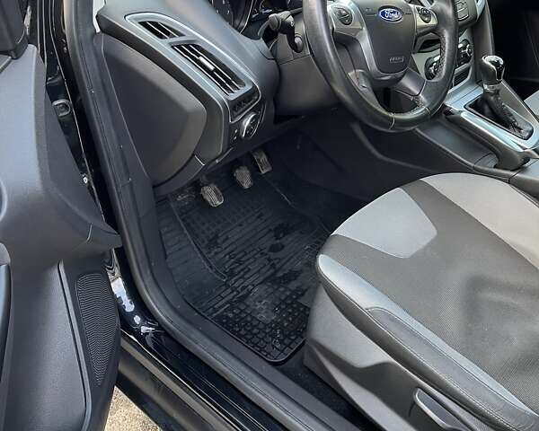 Черный Форд Фокус, объемом двигателя 1.6 л и пробегом 205 тыс. км за 7500 $, фото 6 на Automoto.ua