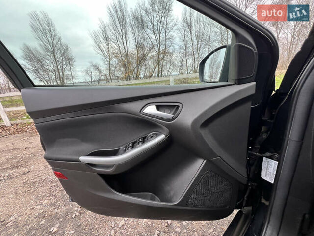 Черный Форд Фокус, объемом двигателя 2 л и пробегом 159 тыс. км за 7999 $, фото 12 на Automoto.ua