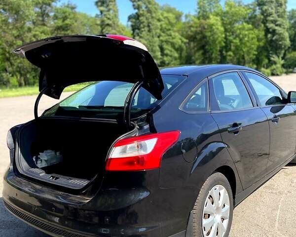 Чорний Форд Фокус, об'ємом двигуна 1.6 л та пробігом 139 тис. км за 9700 $, фото 11 на Automoto.ua