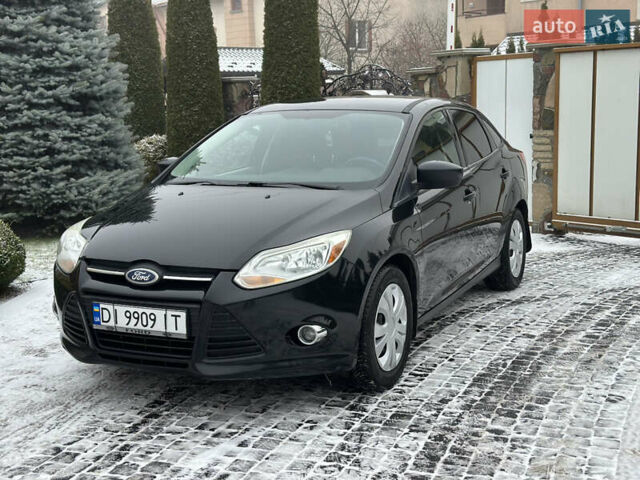 Чорний Форд Фокус, об'ємом двигуна 2 л та пробігом 230 тис. км за 5450 $, фото 4 на Automoto.ua